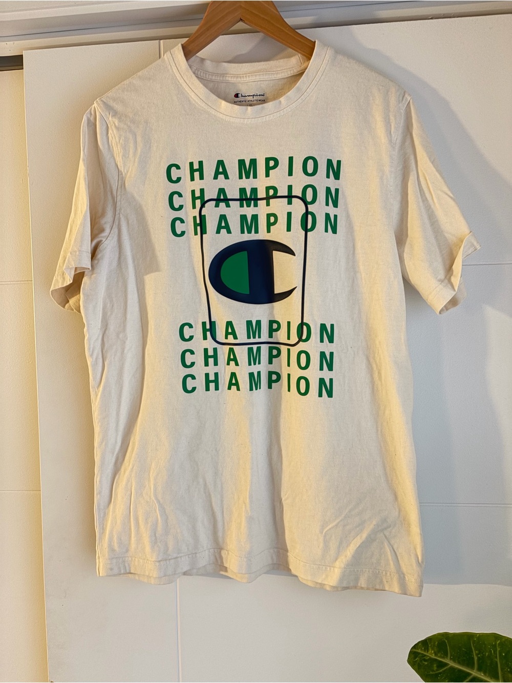 Champion Cream Short Sleeve Tee with Green Logo and Navy Accent